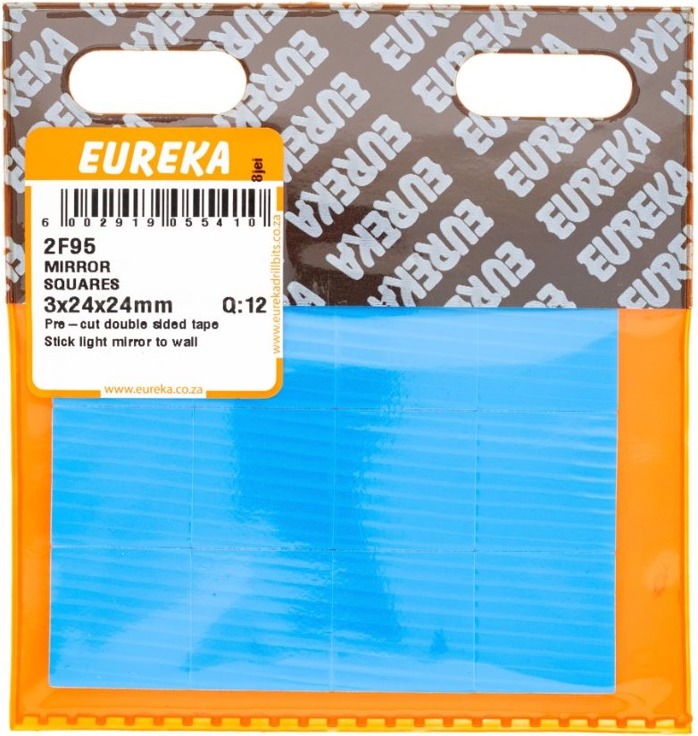 Squares of double-sided tape to stick a mirror to a surface.