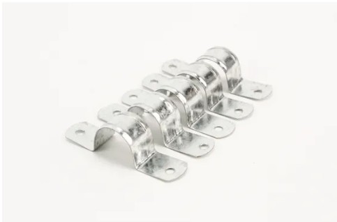 This half saddle is made from galvanized steel and measures 20 mm, providing a durable and corrosion-resistant solution for securing pipes or cables.