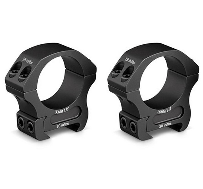 Offering solid mounting and reliability, the medium Vortex Optics Pro Series 30mm Riflescope Ring places the maintube's centerline 1.0" from the top of your rifle's Picatinny/Weaver rail. Offered here as a pair, the rings are made from the lightweight and durable 7075-T6 aluminum alloy treated with a scratch-resistant anodized finish. An integrated recoil lug on each ring helps to spread the recoil force over a larger area for better long-term performance. Each ring comes with a clamp-style Picatinny/Weaver rail mount, fits standard 30mm maintubes, and the ring cap is secured in place with four T-25 Torx cap screws.n