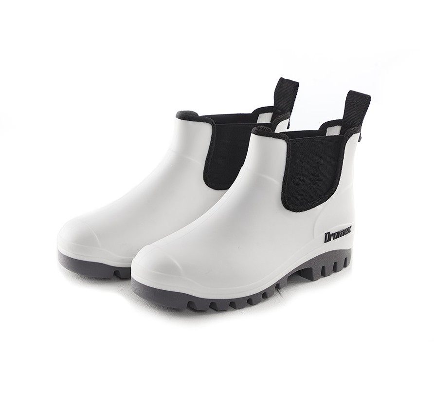 These boots are made from recycled PVC for the upper and virgin PVC for the outsole, making them lightweight, durable, and environmentally friendly. They are easy to clean and dry quickly after use. The interior is lined with nylon for comfort and ease of wear, and they feature a convenient pull tab along with an elastic ankle gusset to make putting them on and taking them off simple. A removable felt insole made from wool provides comfort, breathability, and quick-drying performance thanks to its moisture-wicking properties. The slip-resistant cleated outsole offers strong grip, while the energy-absorbing heel enhances comfort during extended wear. A wide toe box ensures a comfortable fit, making them ideal for long periods of use. These unisex boots are available in two colour options: black with a brown sole and white with a grey outsole.