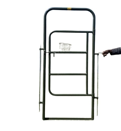The cattle access gate is used with the kraal sides to allow entry into the kraal. Both cattle and farmers can pass through this gate, which functions like a regular door opening in both directions. It features a spring latch for secure closure and include