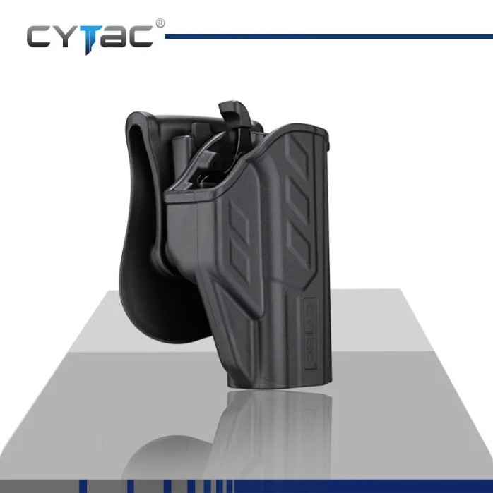 The holster features a low-profile design that rides close to the body, providing excellent concealability for everyday carry. For added security, the handgun locks automatically into place when holstered, while the thumb-release button is positioned close to the body to help prevent unauthorized access. The design also allows for easy access and a natural draw, enabling the user to establish a proper grip on the firearm and release it smoothly with a slight press of the thumb lever. To accommodate different carrying preferences, the holster offers adjustable ride height, allowing users to position it higher or lower for greater comfort. In addition, it is available with either a paddle attachment or a belt clip, giving users the flexibility to choose their preferred mounting option.