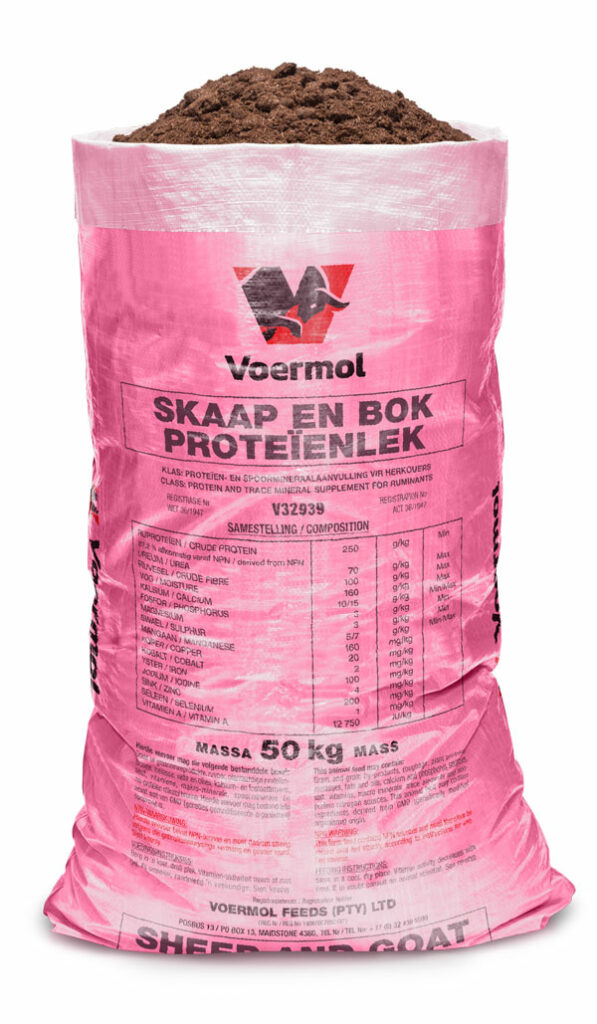 VOERMOL SHEEP AND GOAT PROTEIN LICK (V32939). Class: Protein & Trace Mineral Supplement for Ruminants. A ready-mixed, cost-effective maintenance lick for sheep, goats and other ruminants grazing dry veld or small-grain crop residues. It supplies rumen-digestible protein that stimulates rumen microbes, helping increase the intake and digestion of dry roughage. Optimal sulphur levels support microbial-protein synthesis and wool production, while balanced trace and macro minerals support appetite, fertility and growth. High Vitamin A levels support mucous-membrane health and fertility. Molasses improves palatability and has a mild laxative action that helps prevent dry gall sickness. Feed in lick troughs with sufficient roughage available. Recommended small-stock intake is 120�180 g per animal daily for maintenance, or 300�450 g for body-condition improvement when mixed 1:1 with grain or molasses meal. Follow the prescribed feeding, urea-safety, dosing and vaccination guidance.