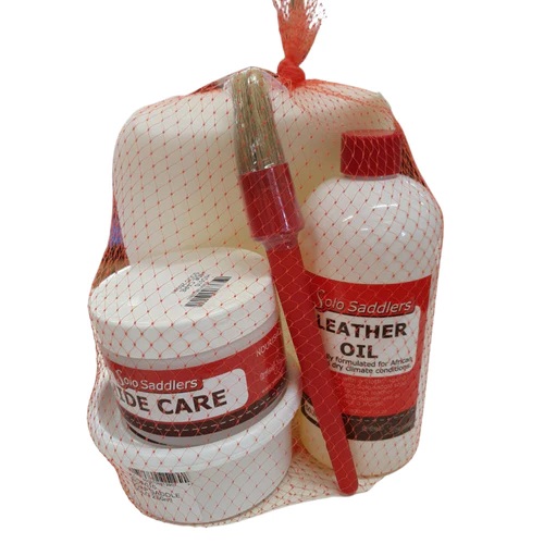 Solo leather dressing, saddle soap, hide care, hoof oiling brush, sponge and leather care instructions in a carry bag.