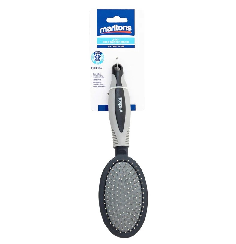 The Marltons 2-in-1 Pin & Bristle Brush is an all-in-one grooming tool designed to detangle, smooth, and enhance your pet�s coat health, keeping them looking and feeling their best. Suitable for dogs of all coat types, the dual-sided brush features pins that lift dirt, detangle knots, and loosen shedding fur, while the bristles help distribute natural oils and add shine. With an ergonomic soft-grip handle for comfort and control and a durable design built for long-lasting use, it is gentle enough for regular daily grooming.